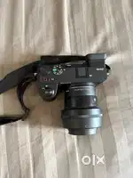 Sony A6700 with Sigma 30mm lens and 128gb memory card