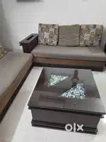 L shaped sofa with centre table