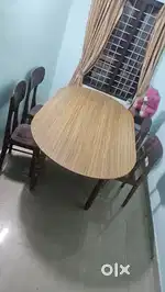 Teak wood dining table with four chairs