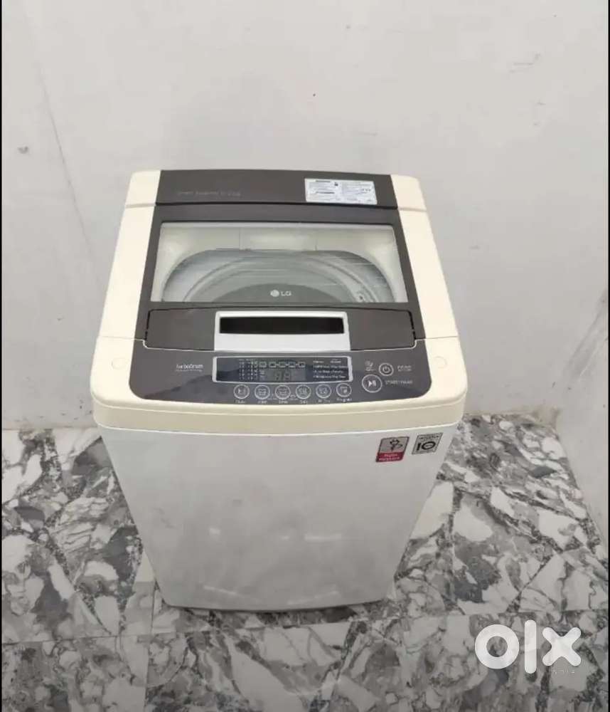 LG top load silver colour washing machine with best offer