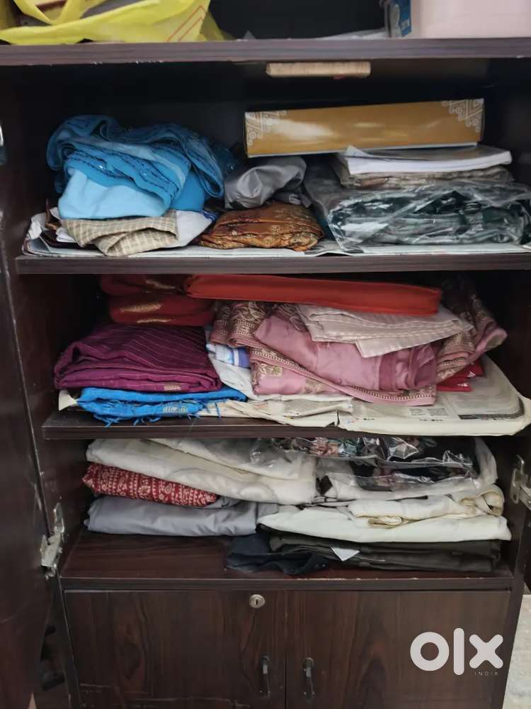 6 seater teak wood dining table with a teak would 3 row shelf