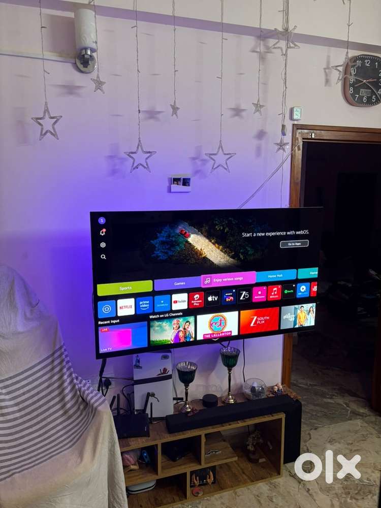 Lg oled tv 55inch with lg sound bar and two gaming monitors