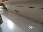 King size bed with a drawer for storage