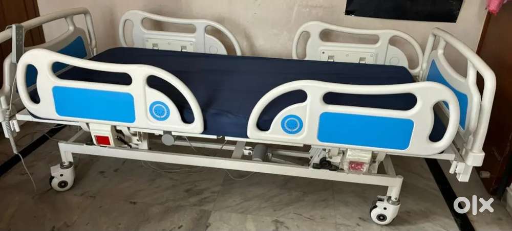 Medical Bed/ Hospital Bed with mattress,remote and guard railing.