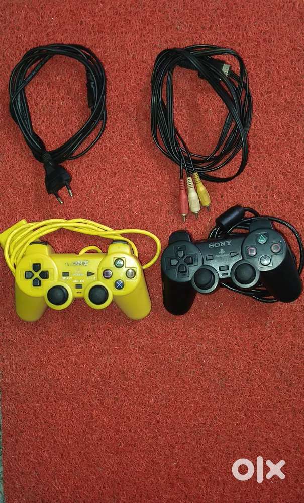 Ps2 slim good condition full kit with 100 games