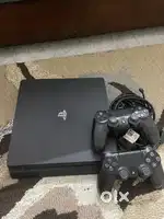 PS 4 with 4 games and 2 controllers