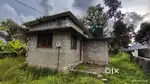 12 cent plot with house having kitchen bathroom and a passage..