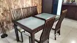 9 yr old Dinning Table with 5 chairs and 5 chair covers