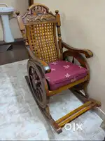 A rocking chair and a pooja maadam are available for sale.