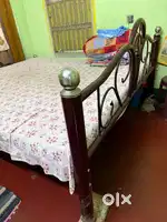 Steel double bed. Brown. Flower design. Stainless.