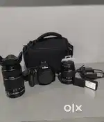 Canon 1300D with 18-55 kit lens and 55-250 zoom lens .