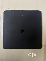 Sony PS4 slim 1tb with 4 games & 2 controllers with power cable