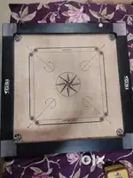 Champion carrom board with striker, powder and piece