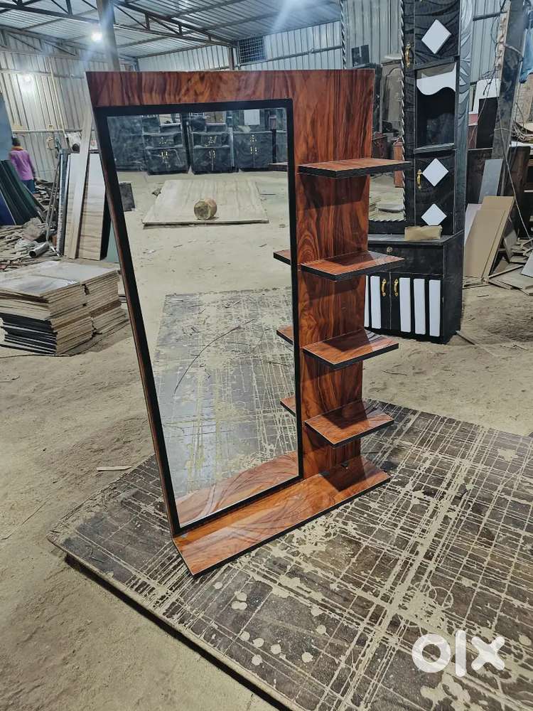 Mirror with shelf s