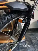 A well used bycycle in good condition with 6 gear