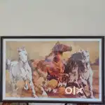 Wall hanging photo of horses