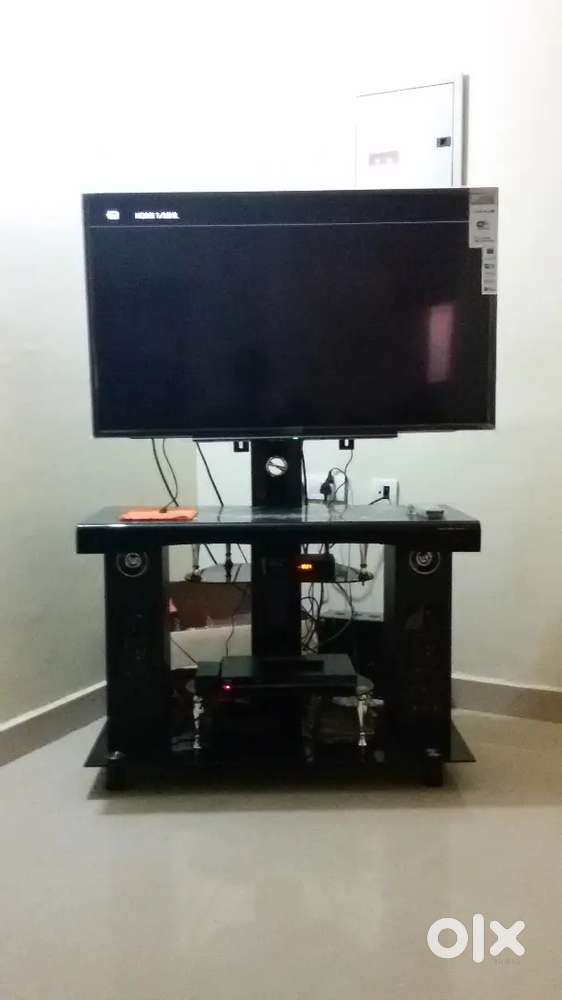 Tv with glass stand