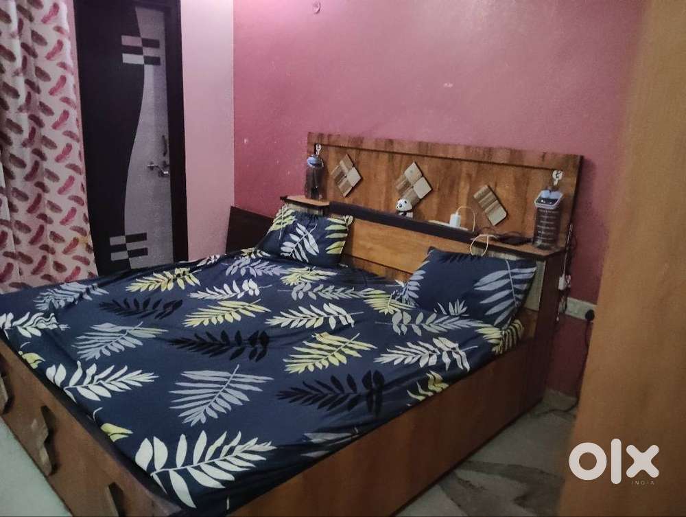 Wooden Double Bed with Storage – Good Condition  Mattress Included