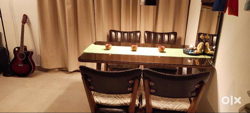 4 seater dining table with 4 cushioned chairs