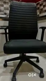 Revolving office chair