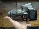 Nikon D5100 DSLR + kit lens + prime lens