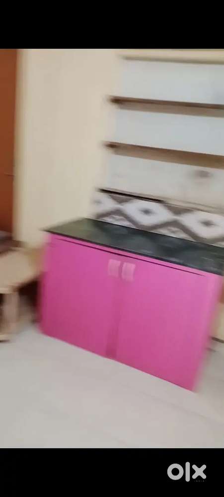 One room with bed and fan