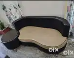 Three Seater Interior Godrej Branded Sofa And Tea Table.