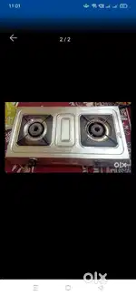Small fridge, gas stove, and other