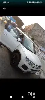 Brezza zxi car available for rent with driver for office purpose