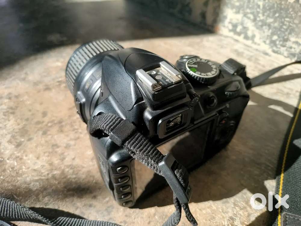 NIKON D3100 with 18-55 mm lens and charger
