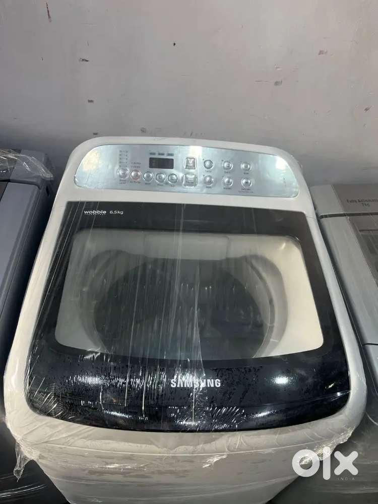 Washing machine automatic top load with warranty good condition