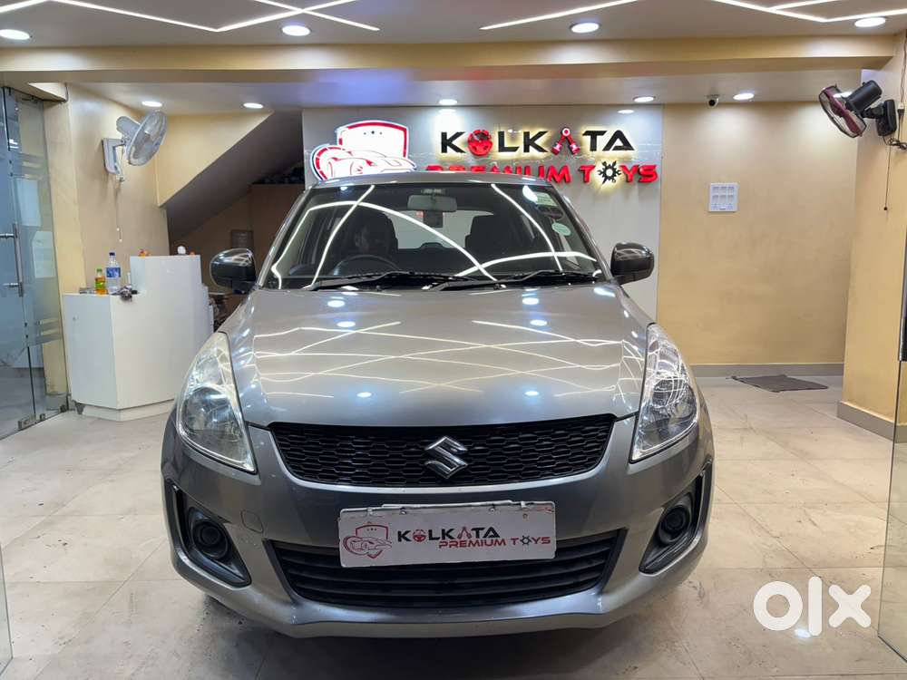 Maruti Suzuki Swift LXI Optional-O, 2017, Petrol