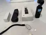DJI Osmo Pocket 3-Axis Gimbal Stabilized Handheld Camera