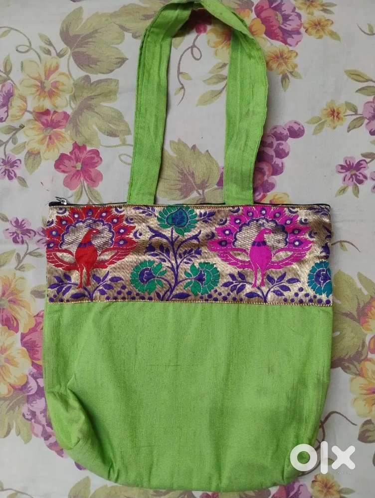 Green colour handbag with paithani design