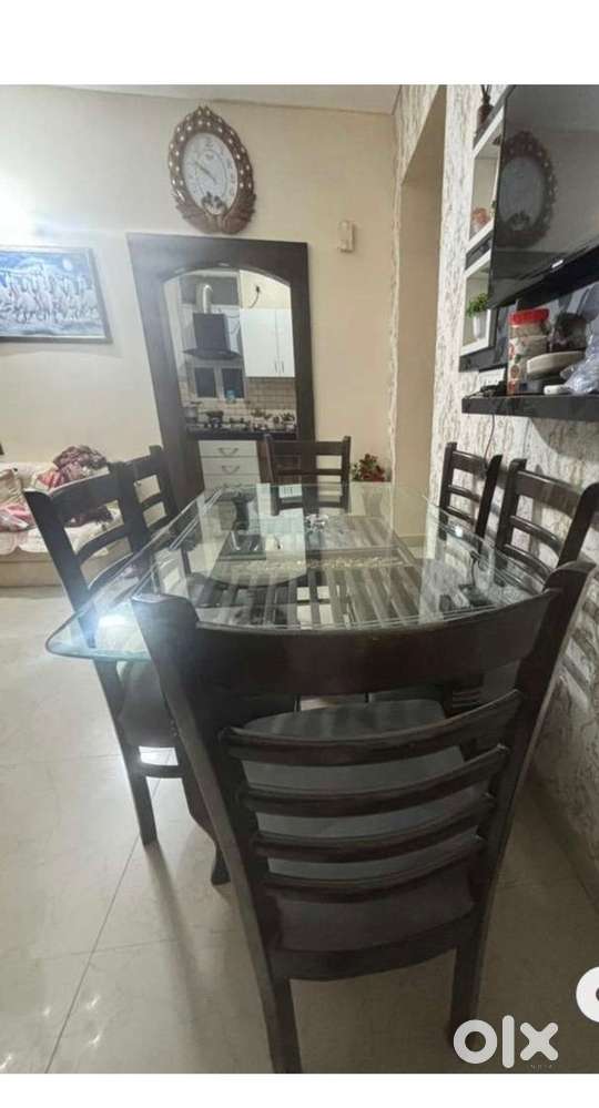 6 chair with Glass table new in condition