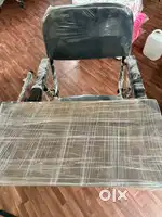 Chair with writing pad