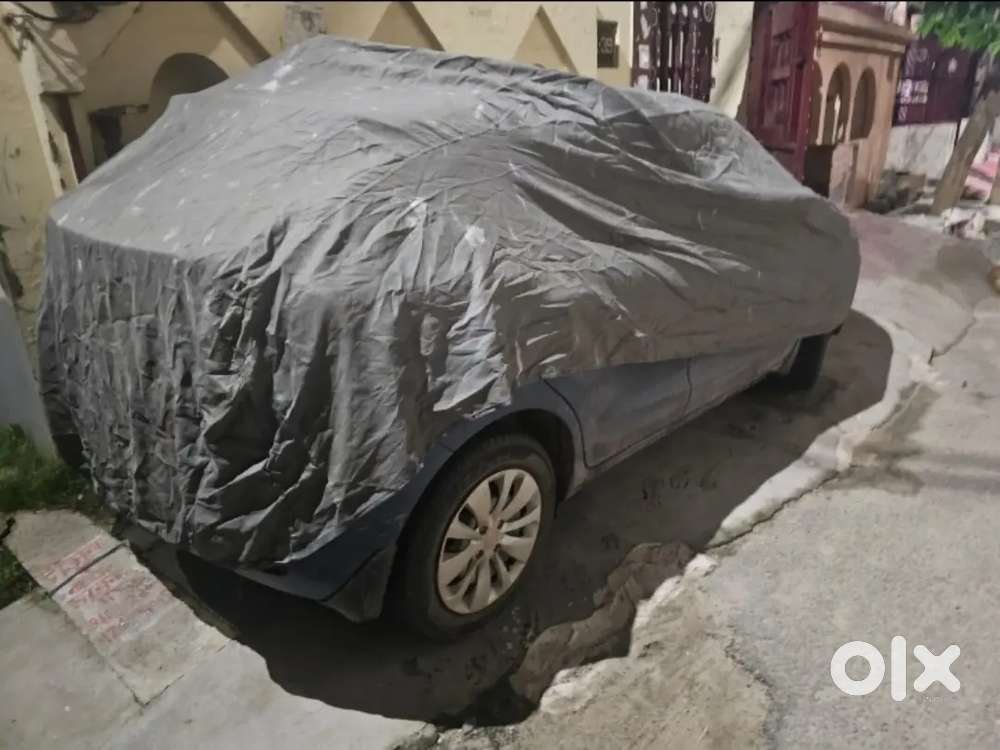 Universal car cover for hatchback fits all hatchbacks.
