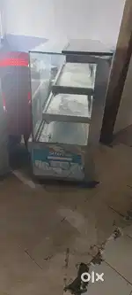 Sweets counter,deep fridges, racks, Wight machine,mixture, jar