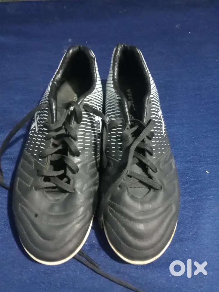 Football playing shoes joker