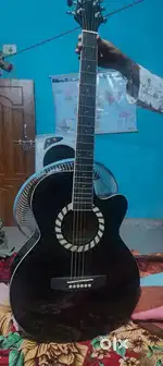 GUITAR ... Its a pretty good guitar if you wanna buy it contact me