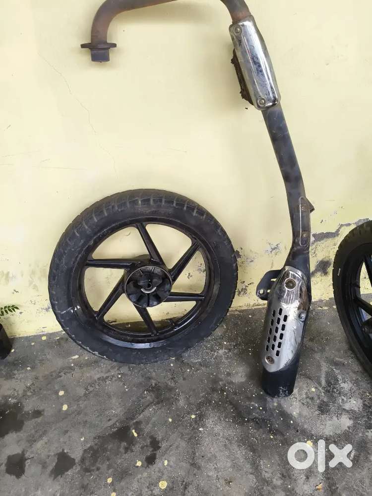 Pulser 180 silencer ,alloy wheels and spares