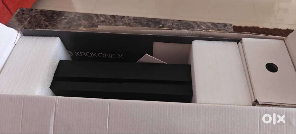 X Box one X 1 TB with one controller rarely used