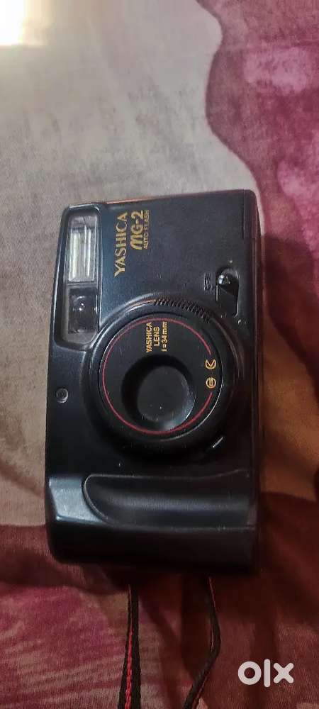 Vintage Japanese YASHICA MG-2 camera and Funky Cam 35mm focus free