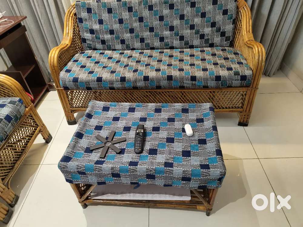2yrs old cane sofa with cushion and centre table