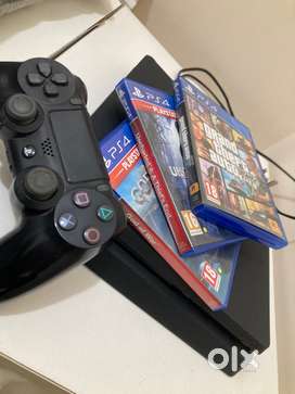 PS4 with 3 games (GTA V ,god of war ,uncharted 4)- Excellent condition