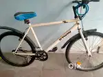 White Btwin sports cycle