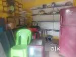 Steel racks and glass cabinets plastic chairs for shop