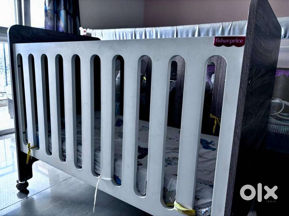 'Fisher-Price Baby Crib with Wheels' for sale