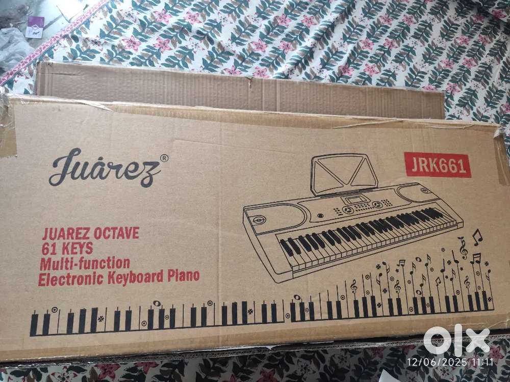 Musical keyboard with 61 keys for sale
