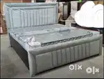 Modern look brown finish double beds with storage